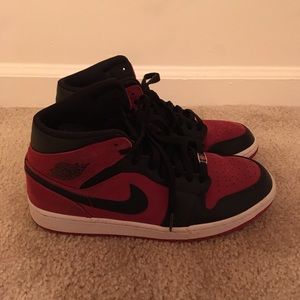 Red and black jordan 1s